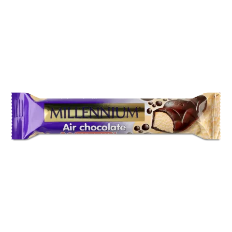 Шоколад белый Millennium пористый в молочном шок.
